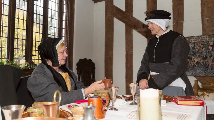 Members of the Companye of Merrie Folke enjoying Tudor yuletide at Paycocke's House, Essex